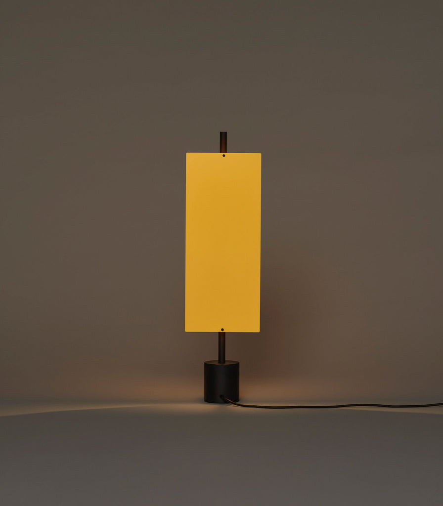 Santa & Cole Lamina Dorada Table Lamp fetaured within interior space