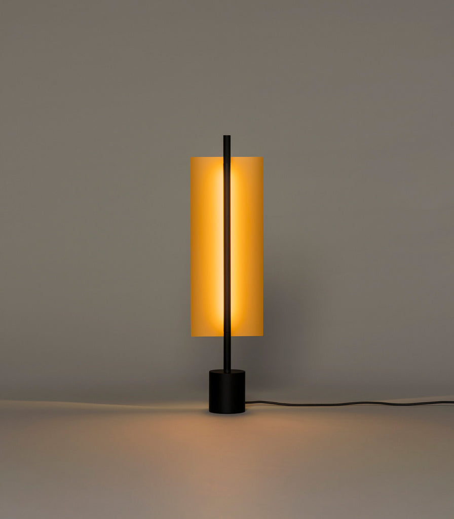 Santa & Cole Lamina Dorada Table Lamp fetaured within interior space