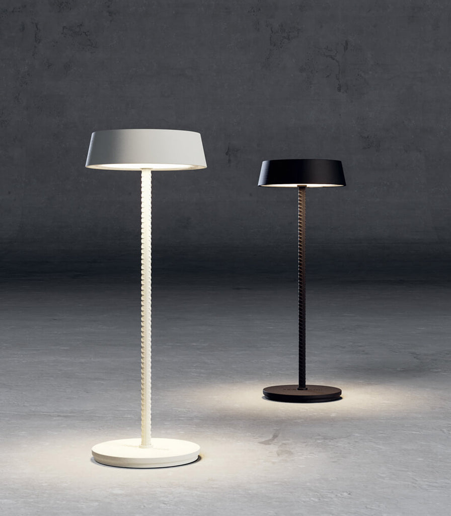 Lodes ROD Table Lamp featured within outdoor space