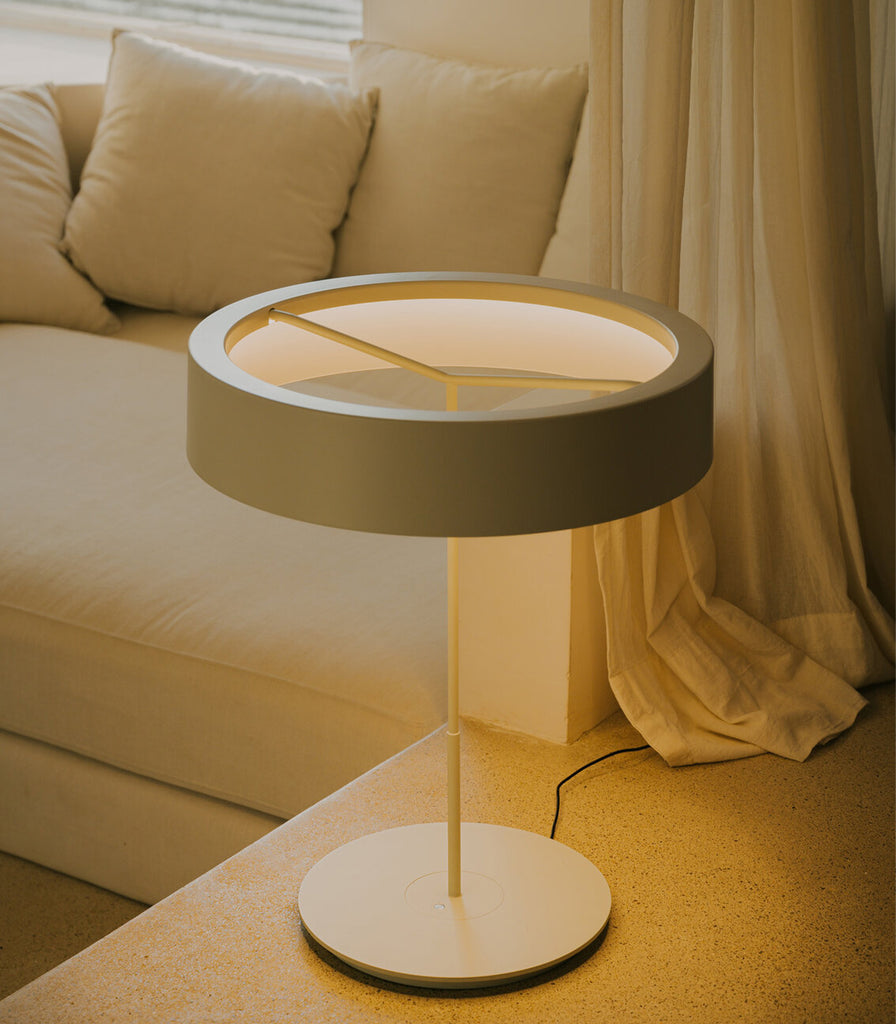 Santa & Cole Sin Table Lamp featured within interior space