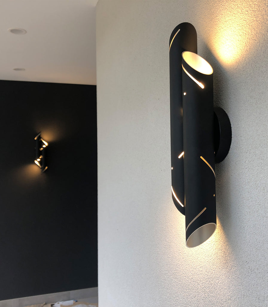 Ilanel Black Rain Wall Light featured within interior space