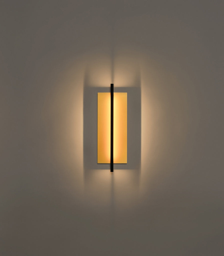 Santa & Cole Lamina Dorada 45 Wall Light featured within interior space