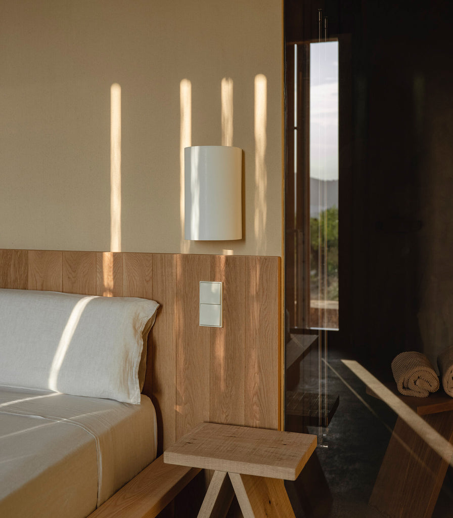 Santa & Cole Singular Wall Light featured within interior space