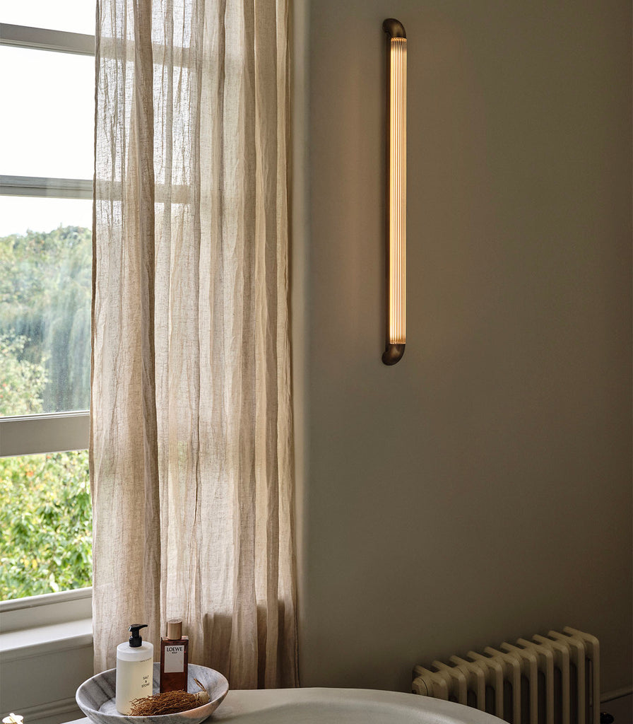 J.Adam&Co. Strata Wall Light featured within interior space