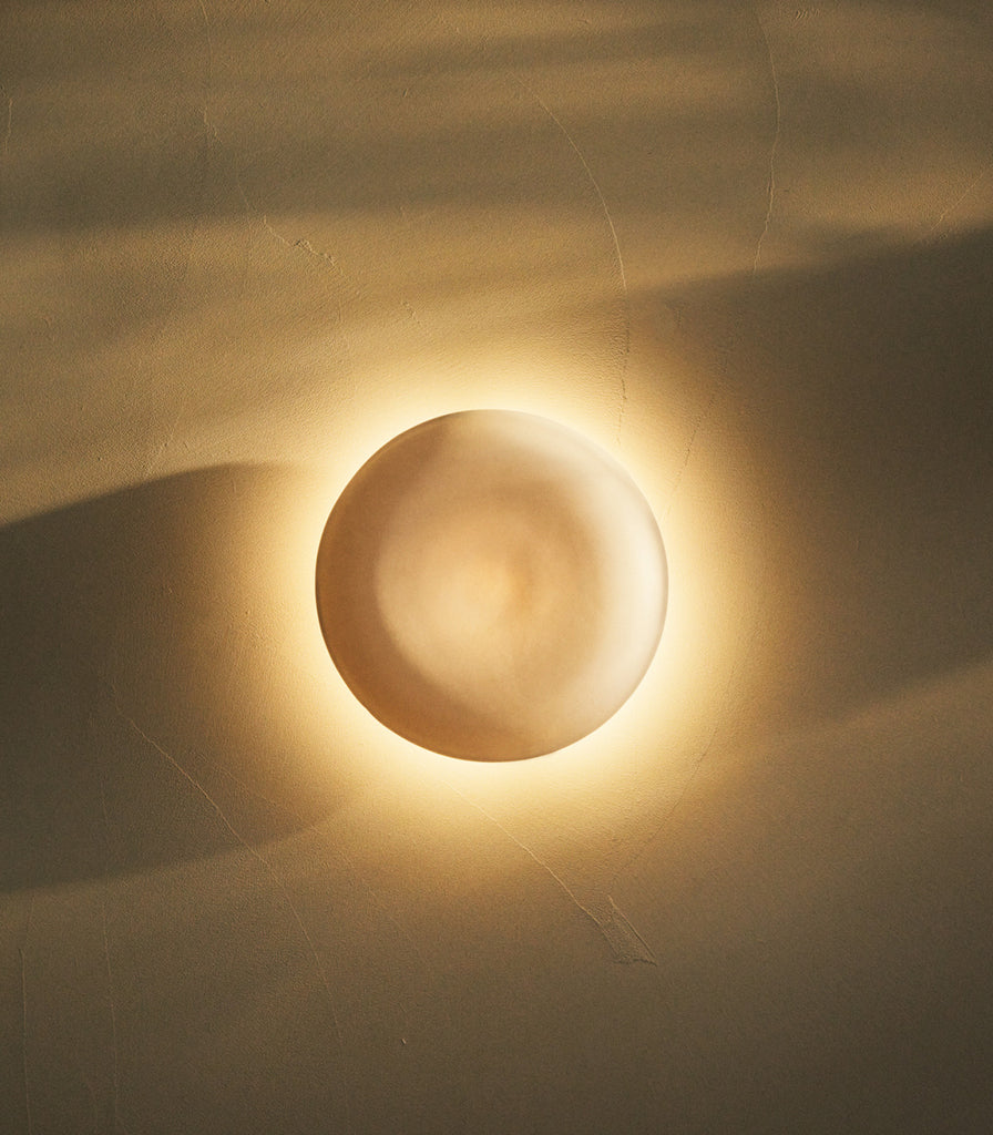 Studio Enti Eclipse Wall Light featured within interior space