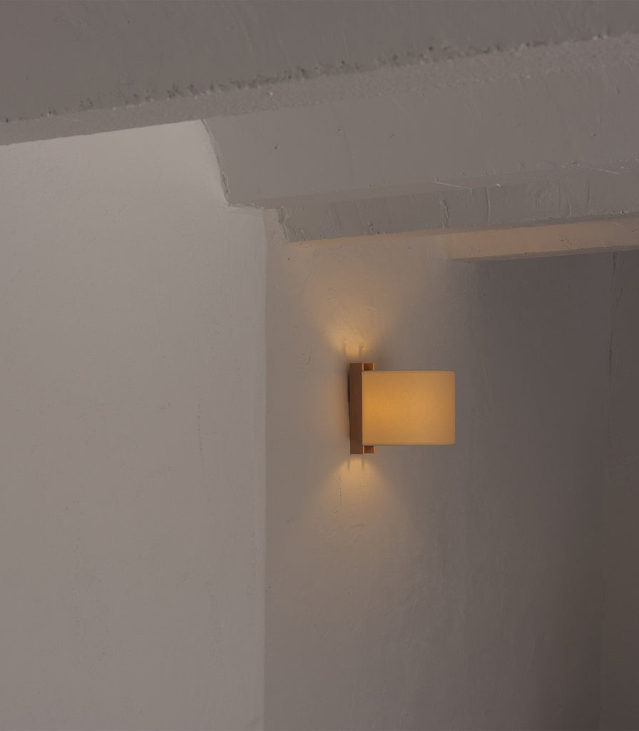 Santa & Cole TMM Corto Wall Light featured within interior space
