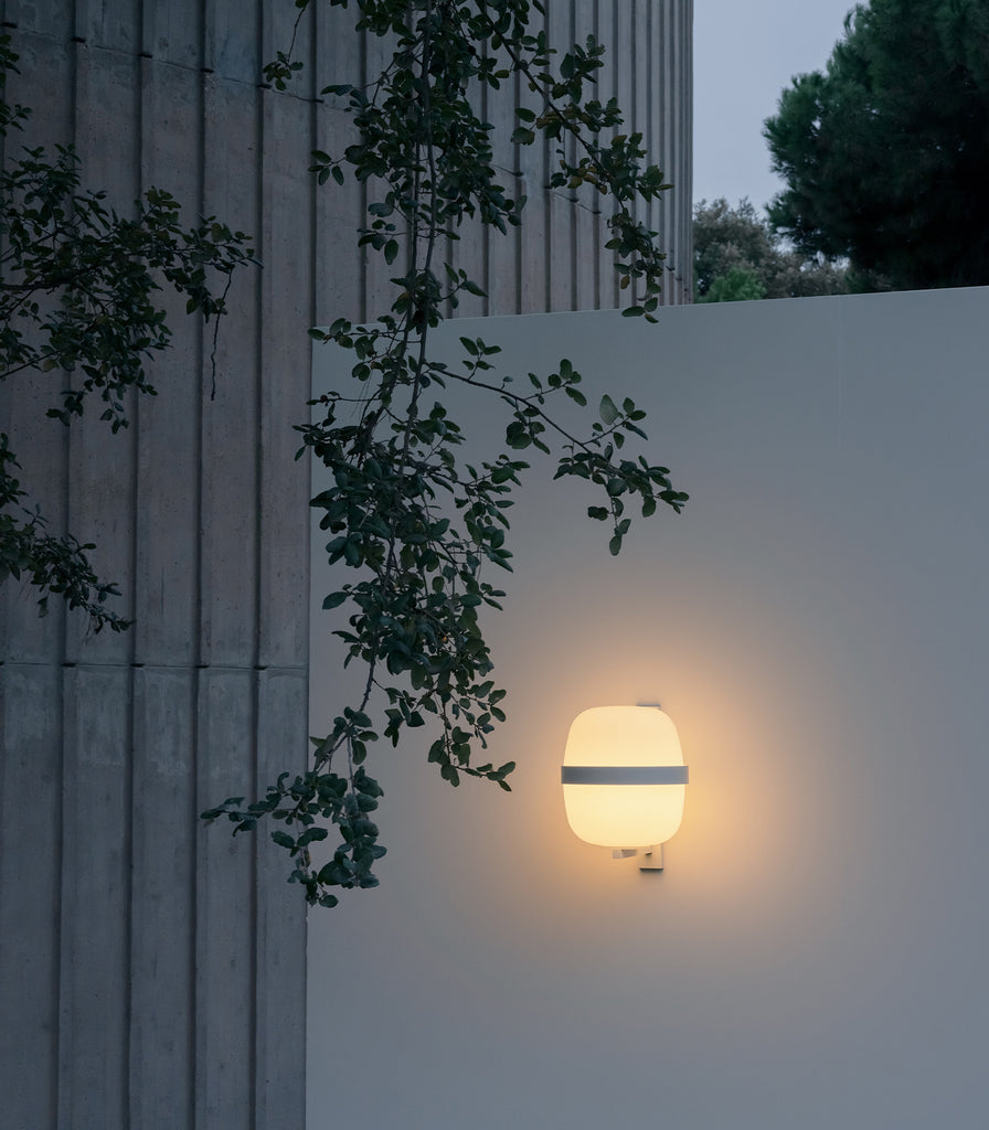 Santa & Cole Wally Cesta Outdoor Wall Light featured within outdoor space