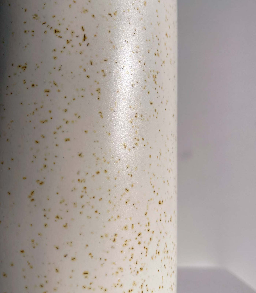 We Ponder Freckles Tall Wall Light in Beige/Fleck finish in an interior setting