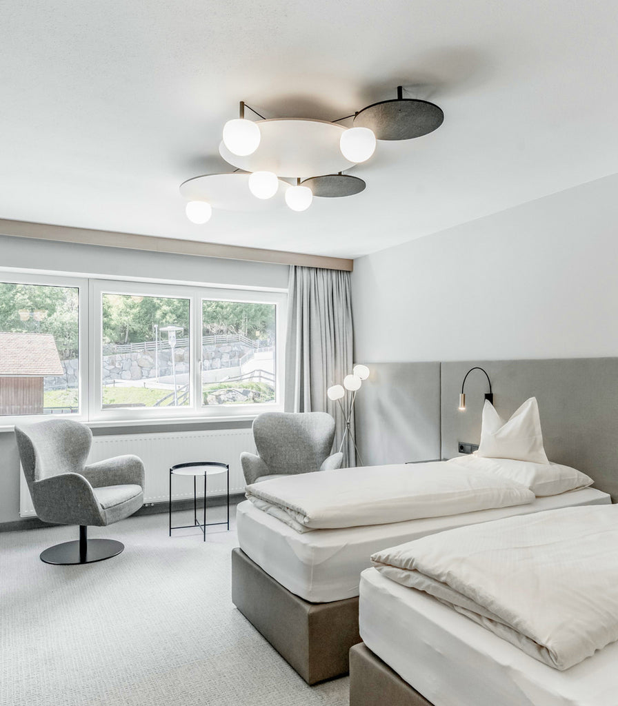 Estiluz Circ 5lt Ceiling Light featured within interior space