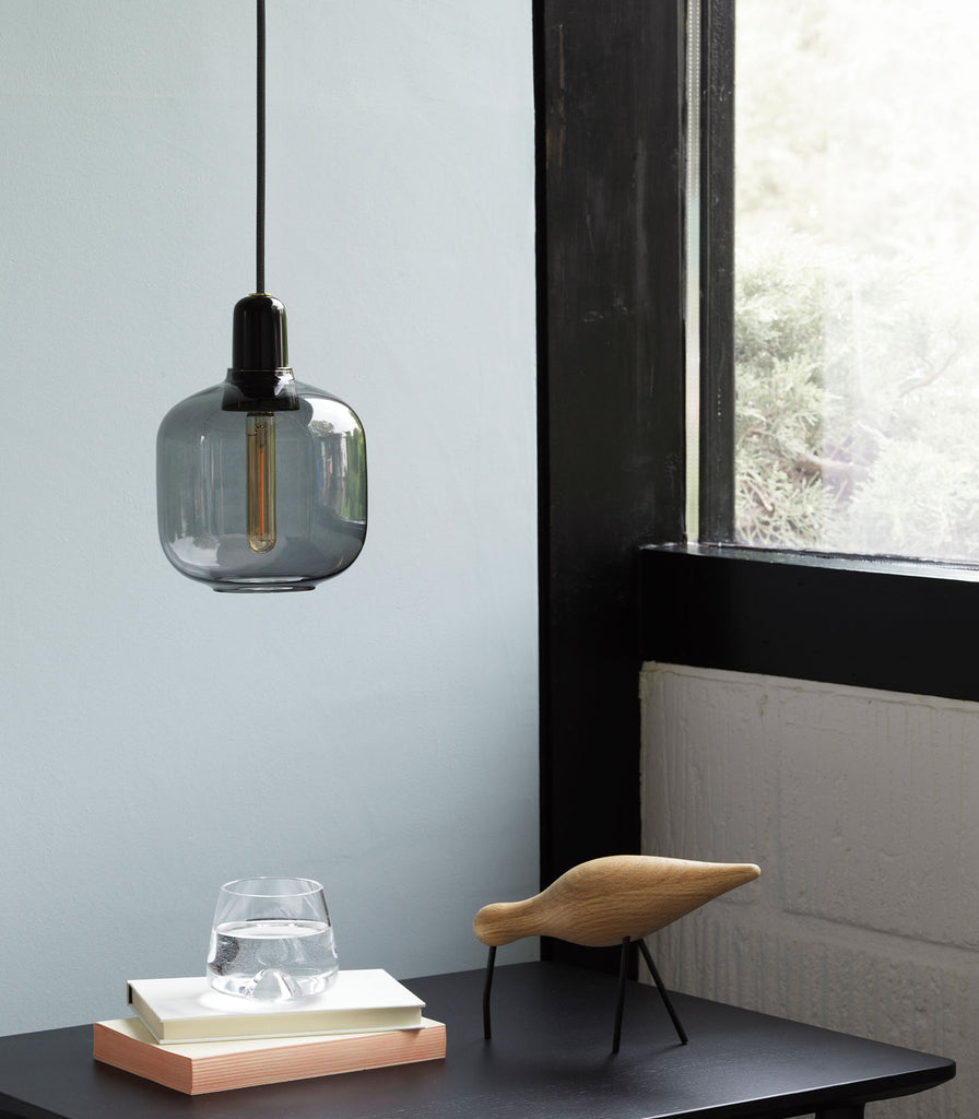 Normann Copenhagen Amp Small Pendant Light featured within interior space