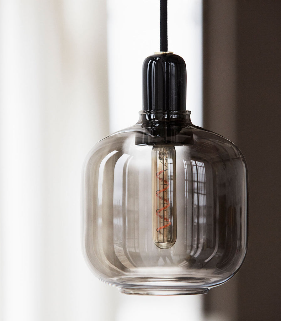 Normann Copenhagen Amp Small Pendant Light featured within interior space