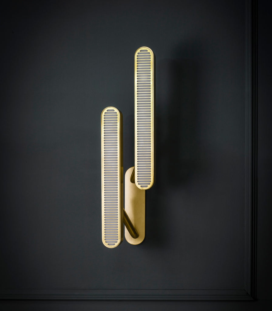 Bert Frank Colt Double Wall Light featured within a interior space
