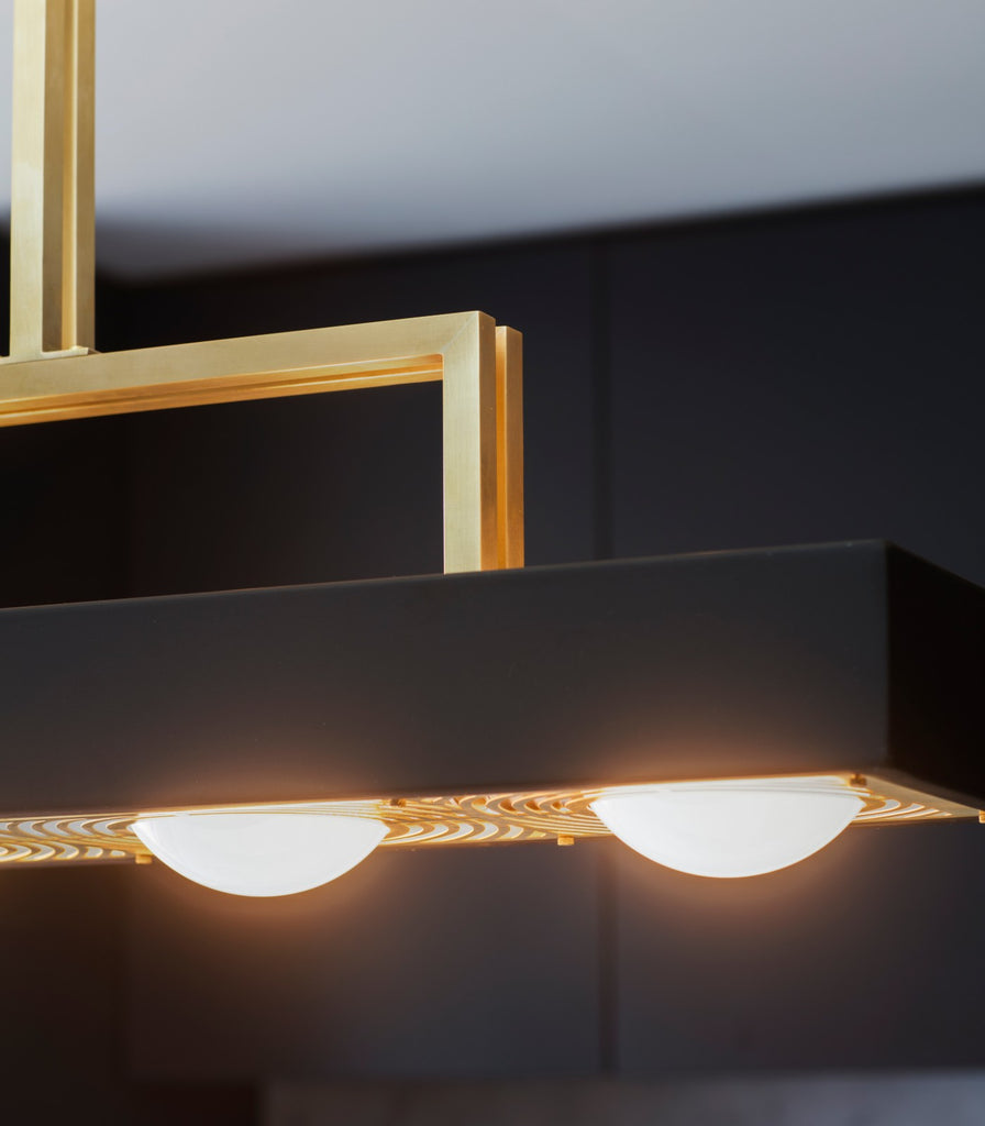 Bert Frank Kernel Pendant Light featured within a interior space
