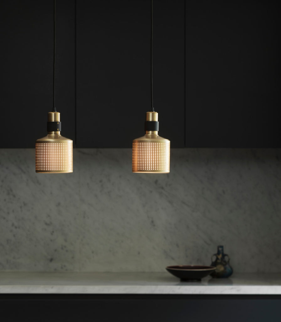 Bert Frank Riddle Pendant Light featured within a interior space