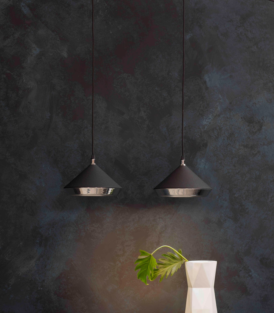 Bert Frank Shear Pendant Light featured within a interior space