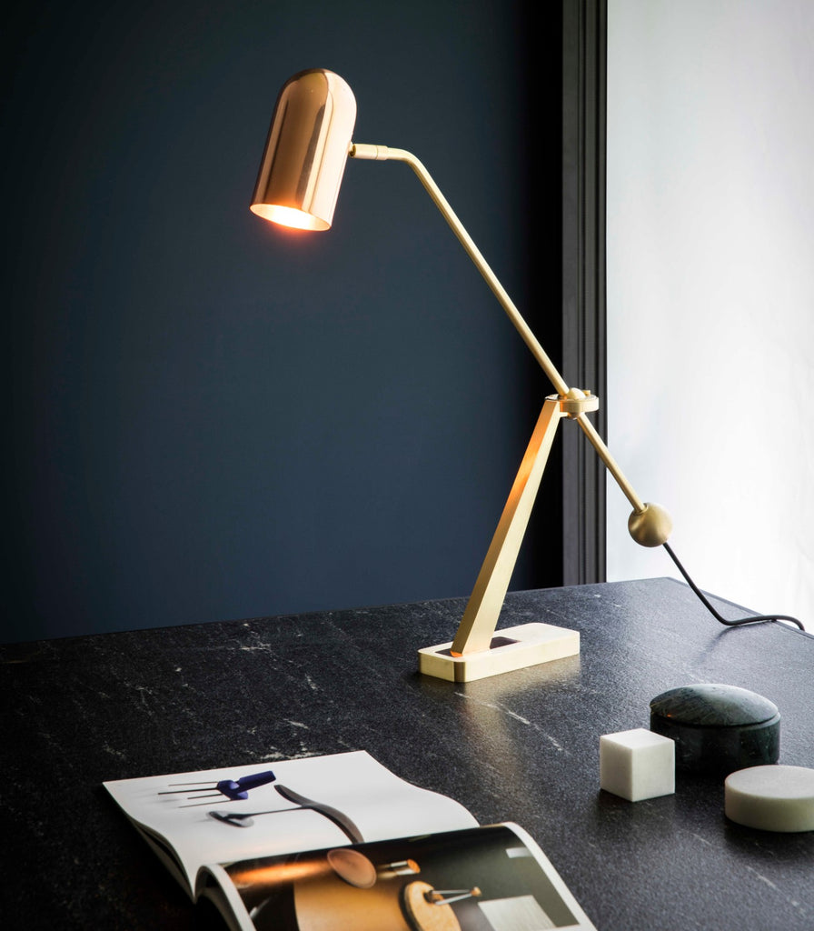 Bert Frank Stasis Table Lamp featured within a interior space 