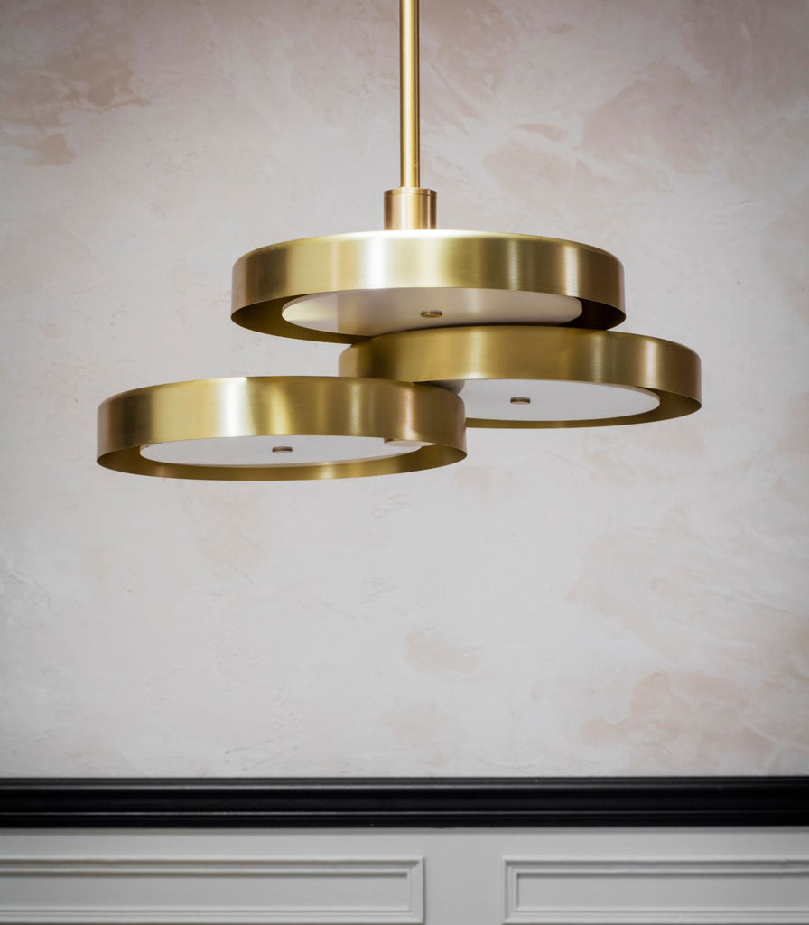 Bert Frank Triarc Pendant Light featured within a interior space