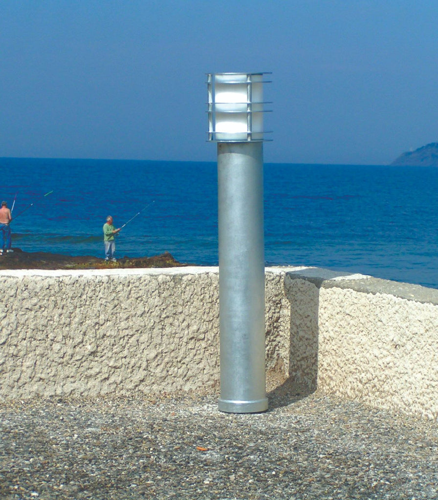 Norlys Stockholm Bollard Light featured within a outdoor space