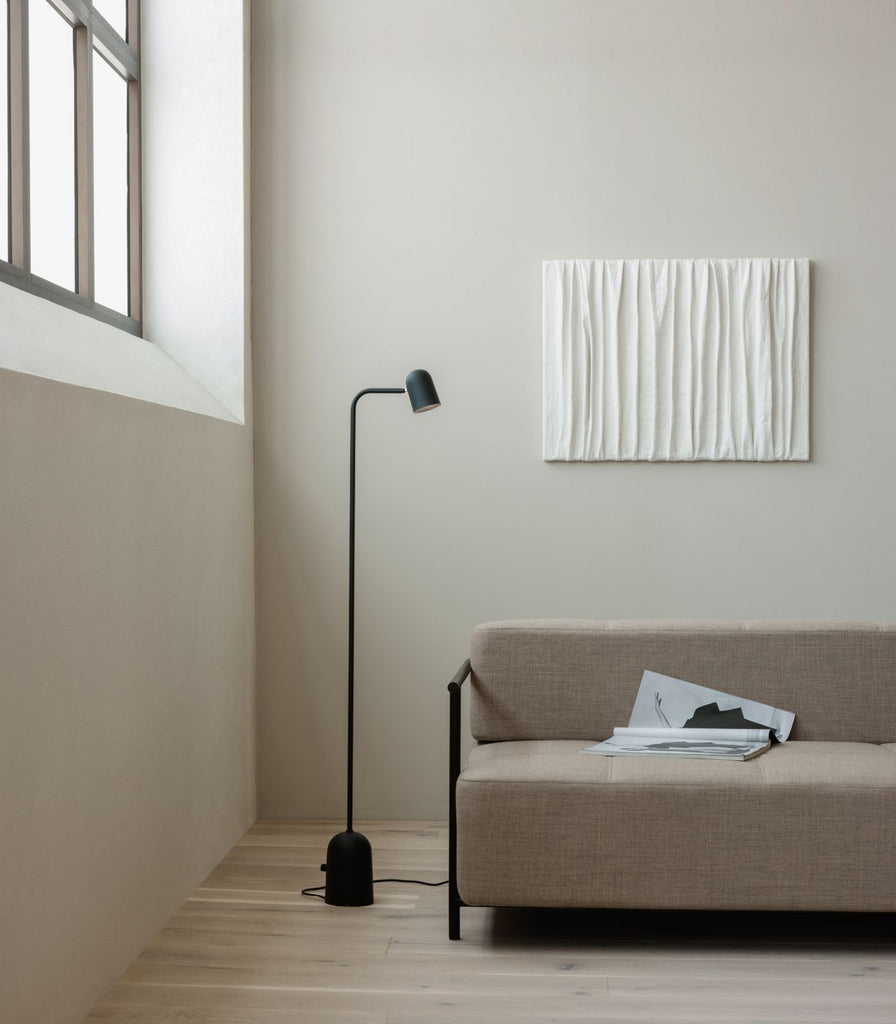 Northern Buddy Floor Lamp featured within a interior space