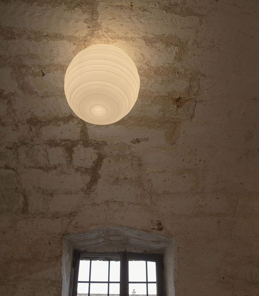 Karman Braille Ceiling/Wall Light featured within a interior space