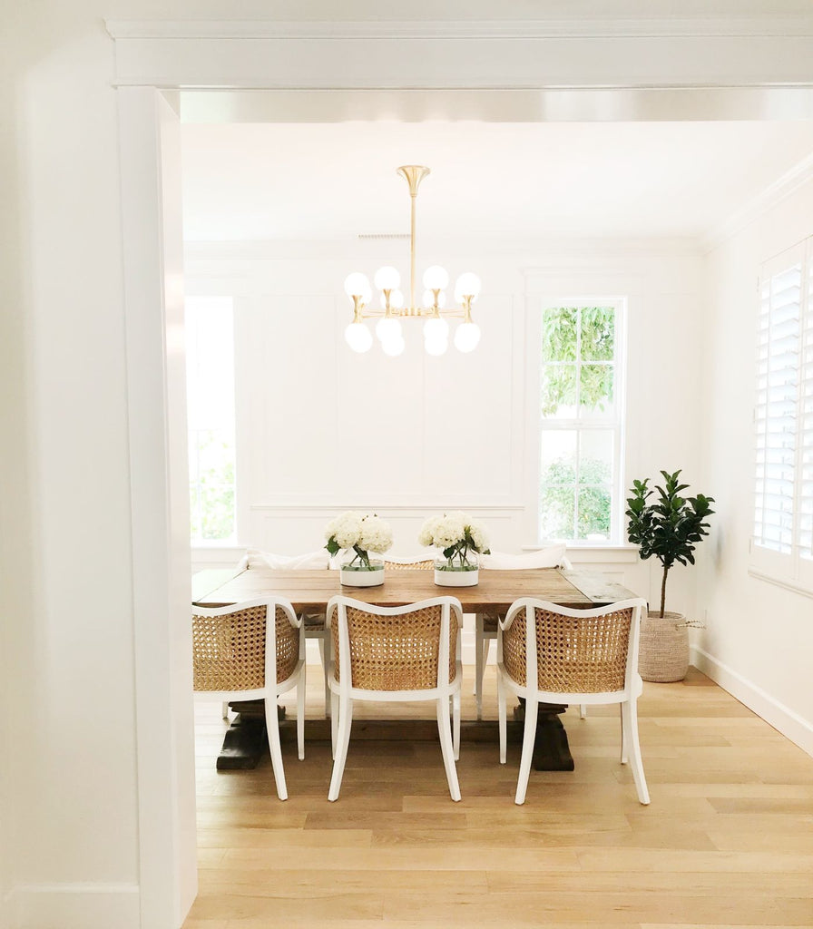 Hudson Valley Astoria Chandelier hanging over dining table