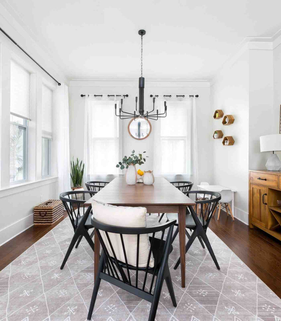 Hudson Valley Brigitte Chandelier hanging over dining table