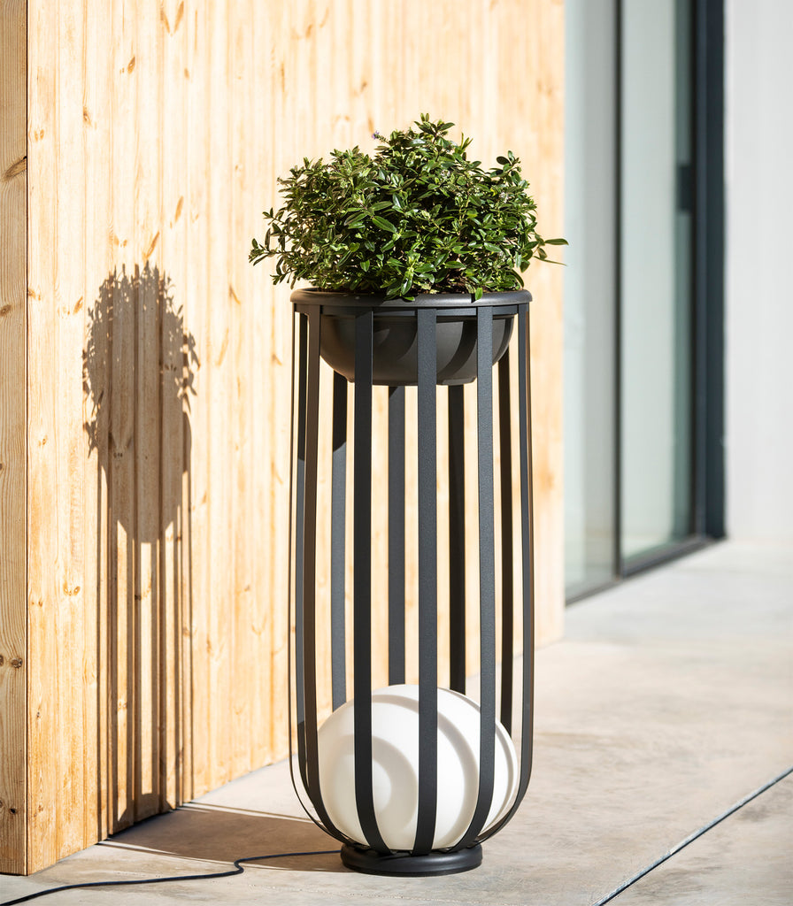 Estiluz Bols Tall Outdoor Floor Lamp featured within outdoor space