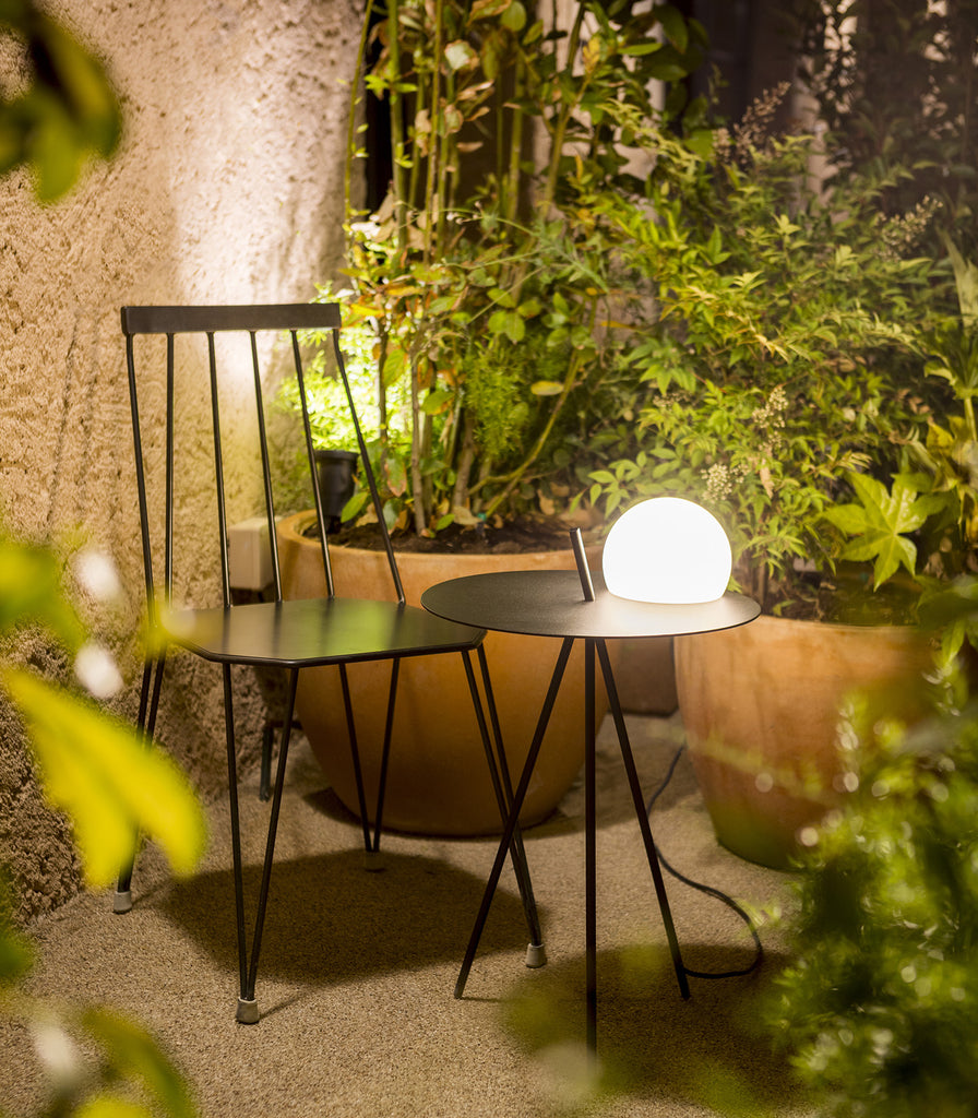 Estiluz Circ Outdoor Floor Lamp featured within outdoor space