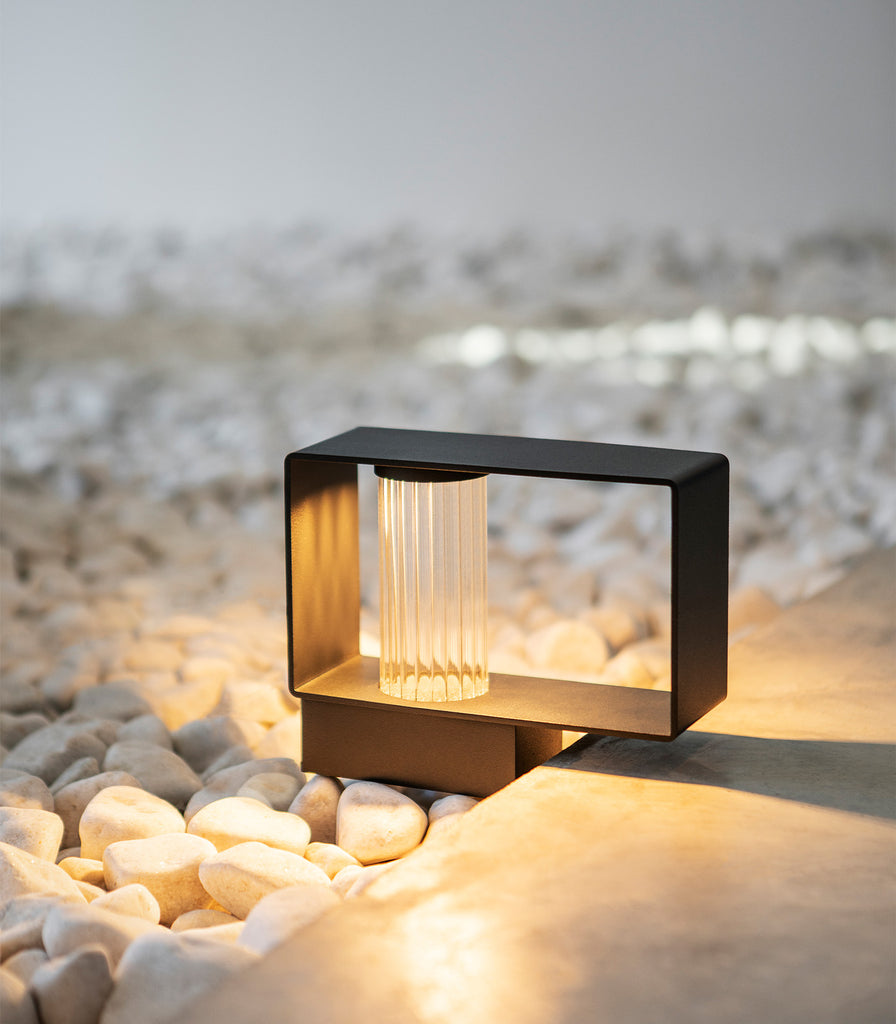Estiluz Frame Mini Bollard Light featured within outdoor space