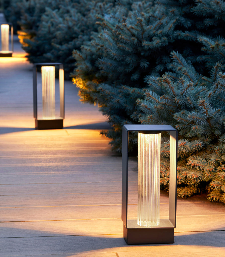 Estiluz Frame Bollard Light featured within outdoor space