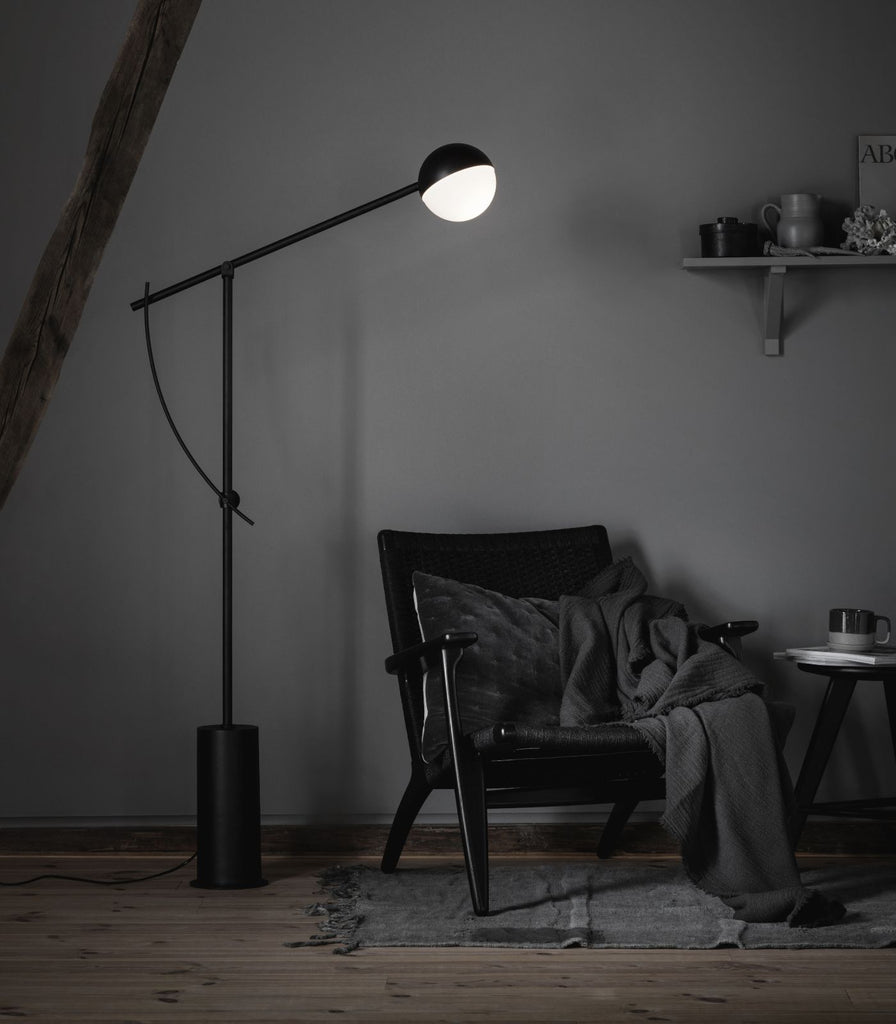 Northern Balancer Floor Lamp featured within a interior space