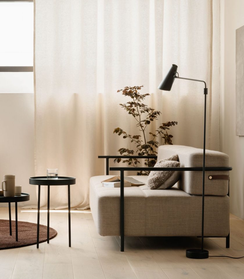 Northern Birdy Swing Floor Lamp featured within a interior space