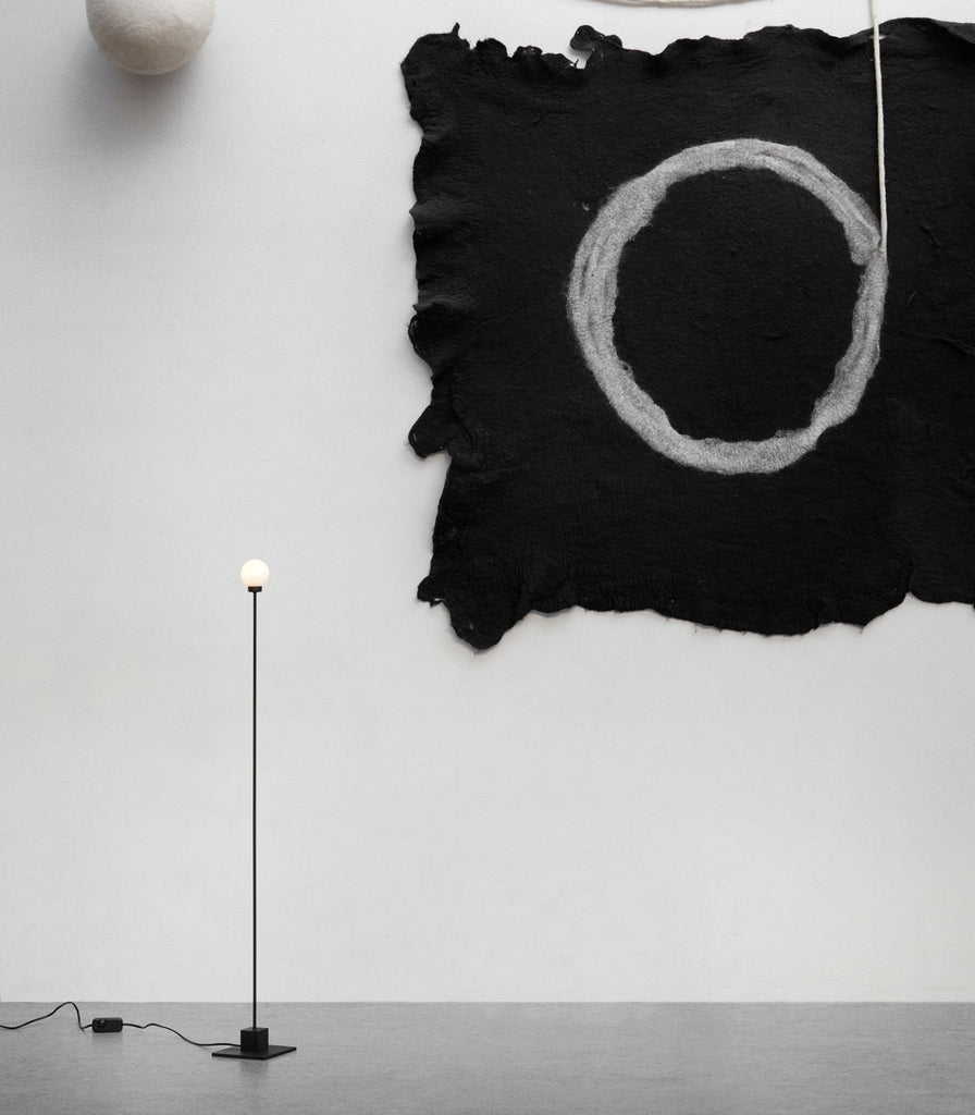 Northern Snowball Floor Lamp featured within a interior space