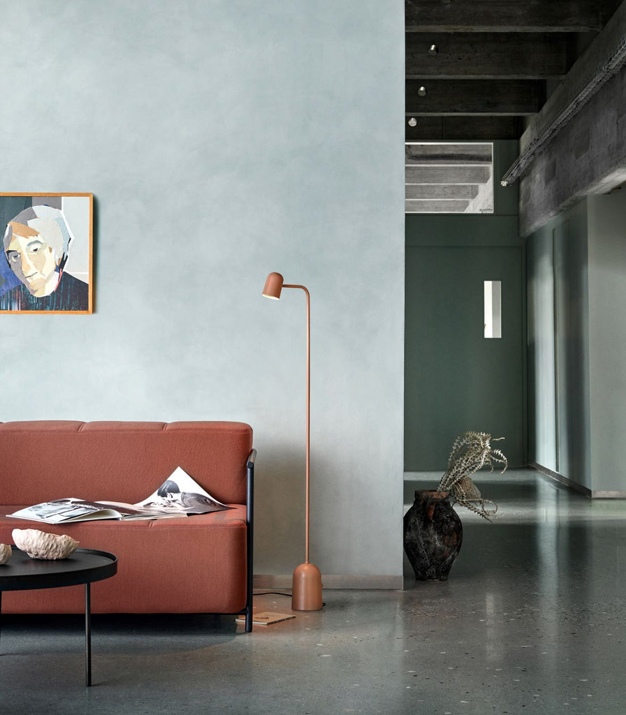 Northern Buddy Floor Lamp featured within a interior space