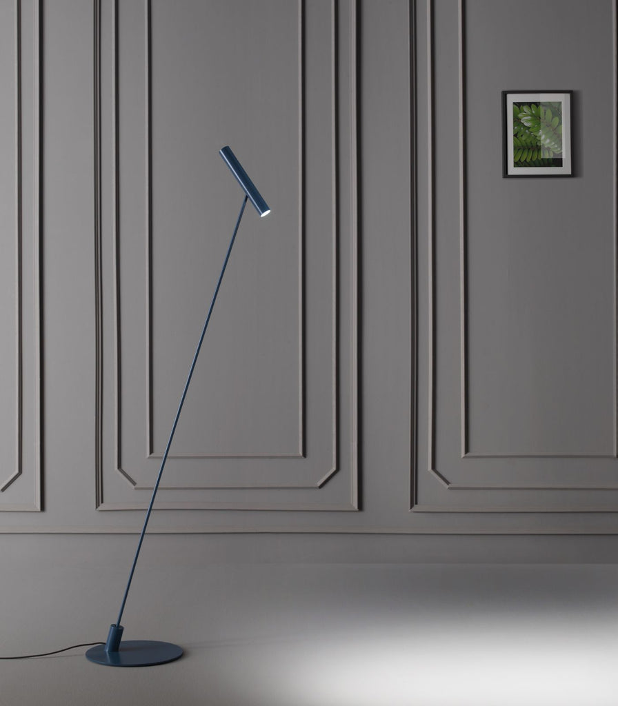 Oty Pinocchio Floor Lamp in Blue featured within a interior space