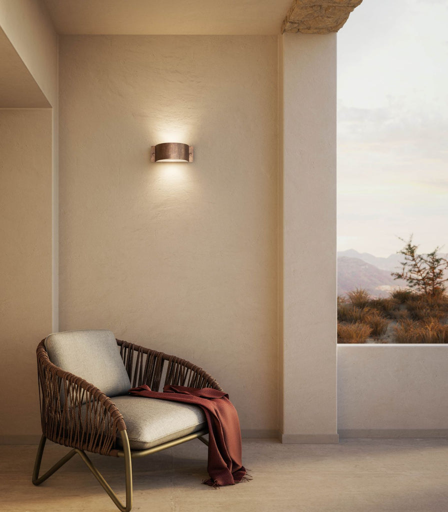 II Fanale Decori Arc Wall Light featured within an outdoor space