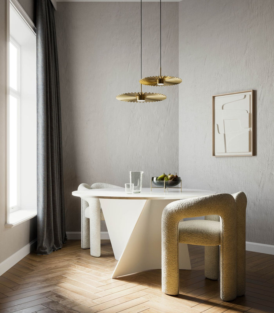 Il Fanale Plie Pendant Light hanging over dining table
