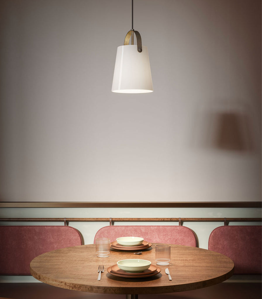 Il Fanale Bell Pendant Light hanging over dining table