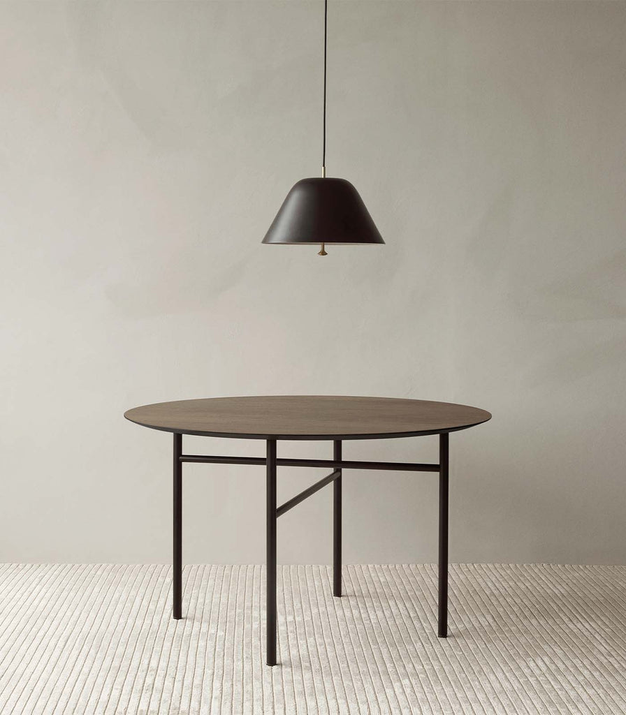 Menu Lighting Levitate Pendant Light hanging over dining table