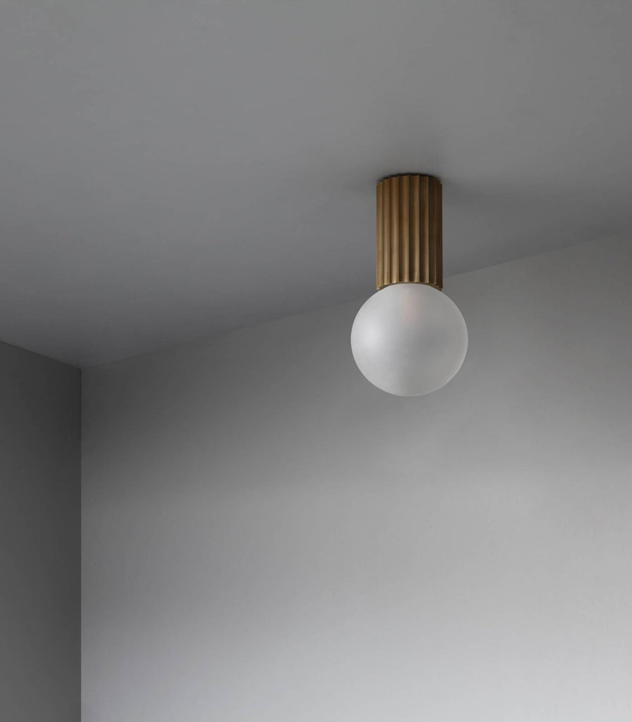 Marz Designs Attalos Ceiling Light in Brushed Brass/Frosted Glass featured within interior space