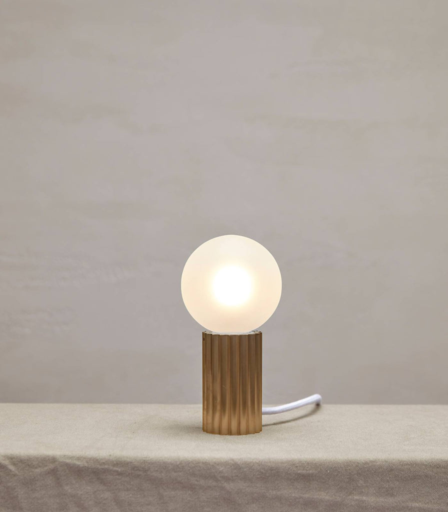 Marz Designs Attalos Table Lamp faetured within interior space