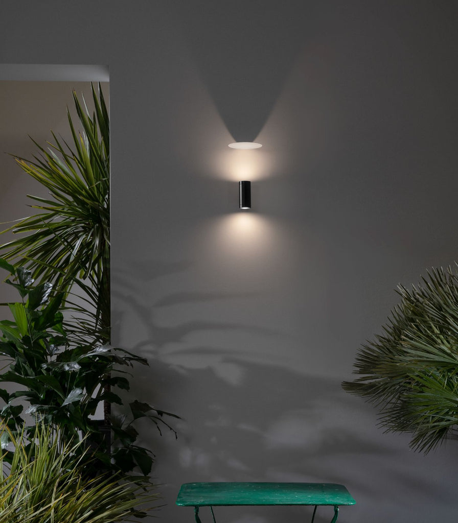 Karman Movida Wall Light featured within a outdoor space