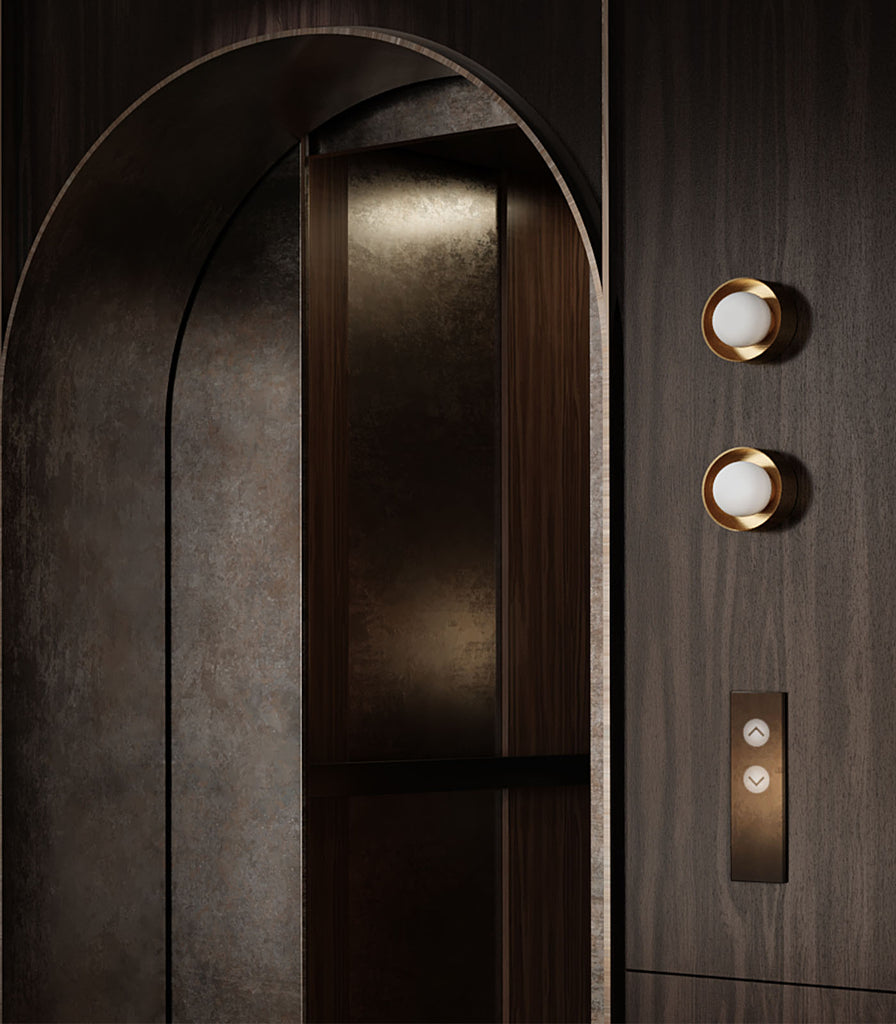 Lighting Republic Orb Sur Wall Light brass finish in interior space