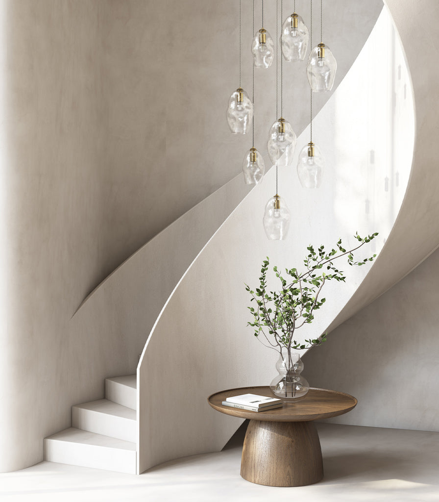 Lighting Republic Organic Pendant Light Old Brass in Medium & Large size hanging with a void staircase 