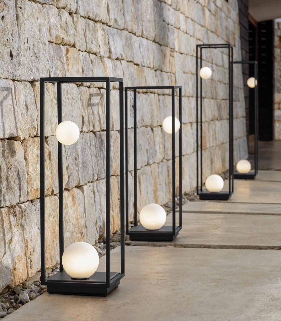 Karman Abachina Outdoor Floor Lamp featured within a outdoor space