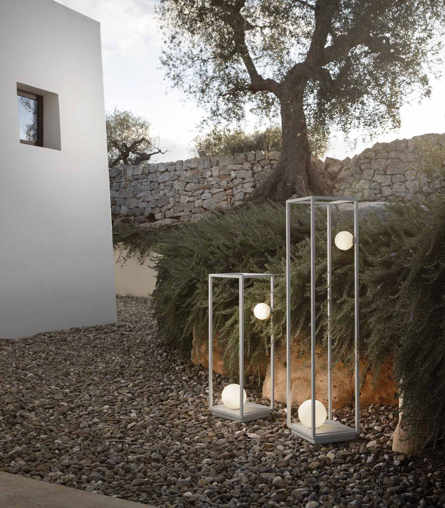 Karman Abachina Outdoor Floor Lamp featured within a outdoor space