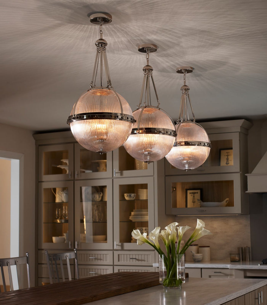 Elstead Aster Pendant Light hanging over dining table