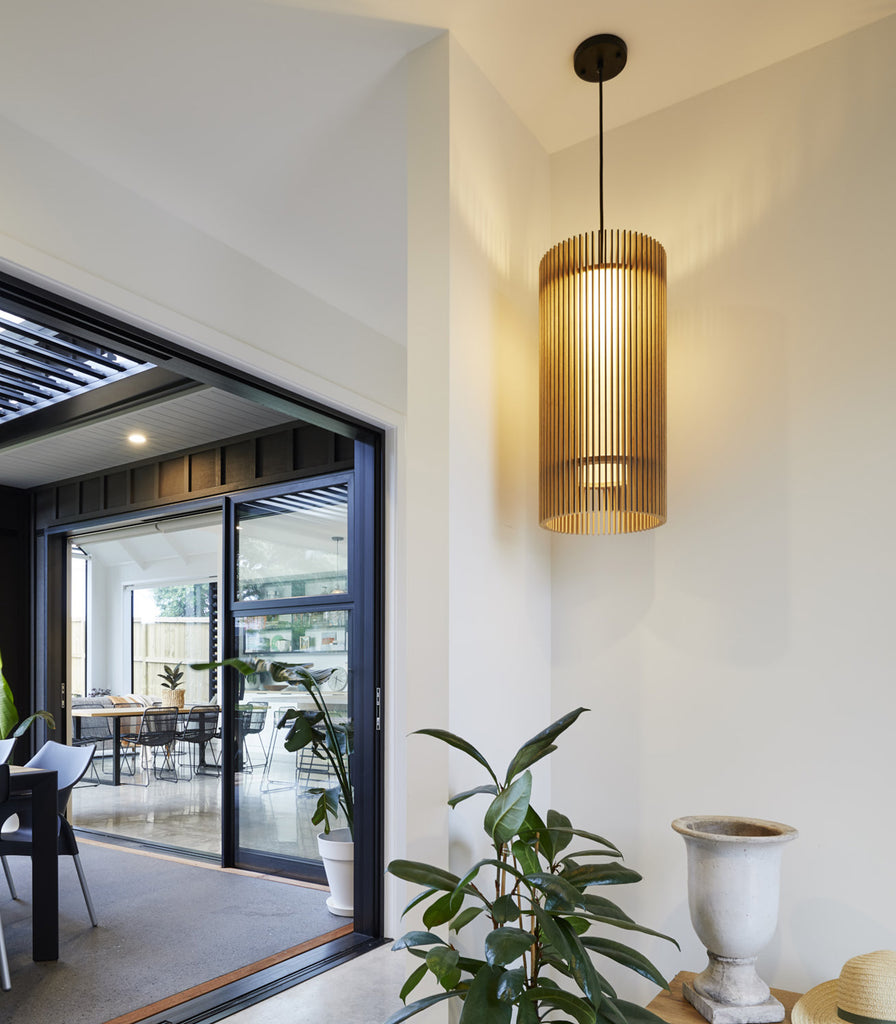 Maker Design Studio iO long pendant light in interior space