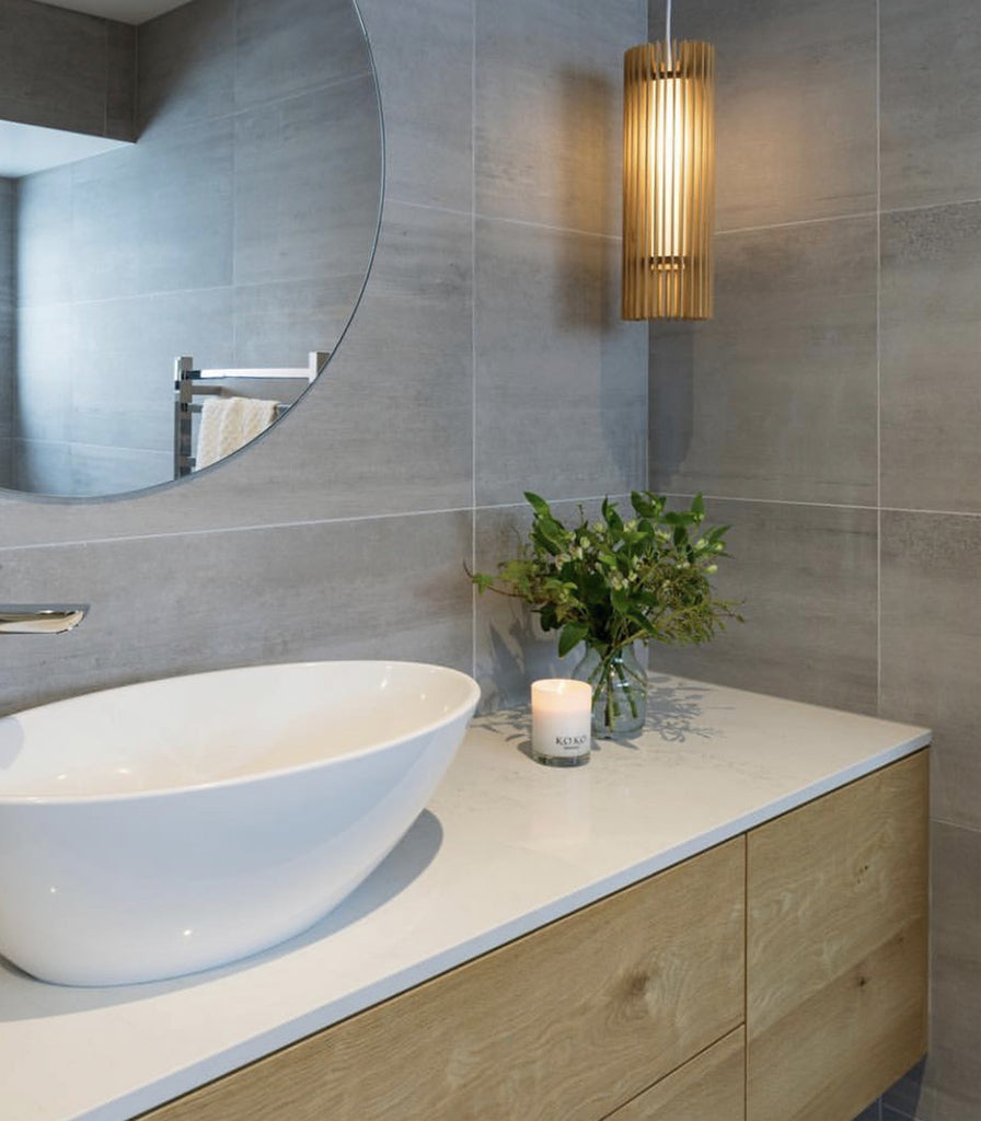 Maker Design Studio iO long pendant light in bathroom
