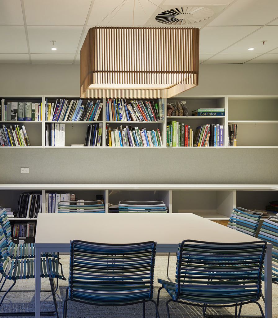 Maker Design Studio iO square pendant light in plywood in interior space